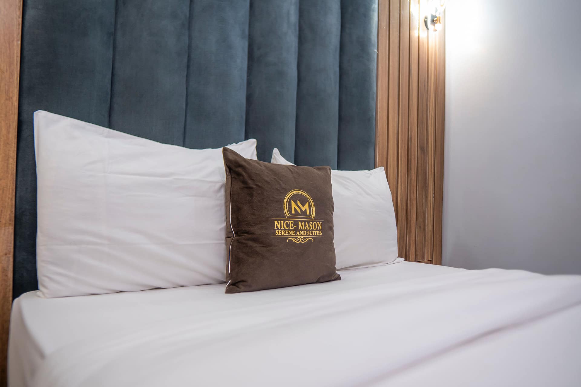 Mason Deluxe room with velvet headboard