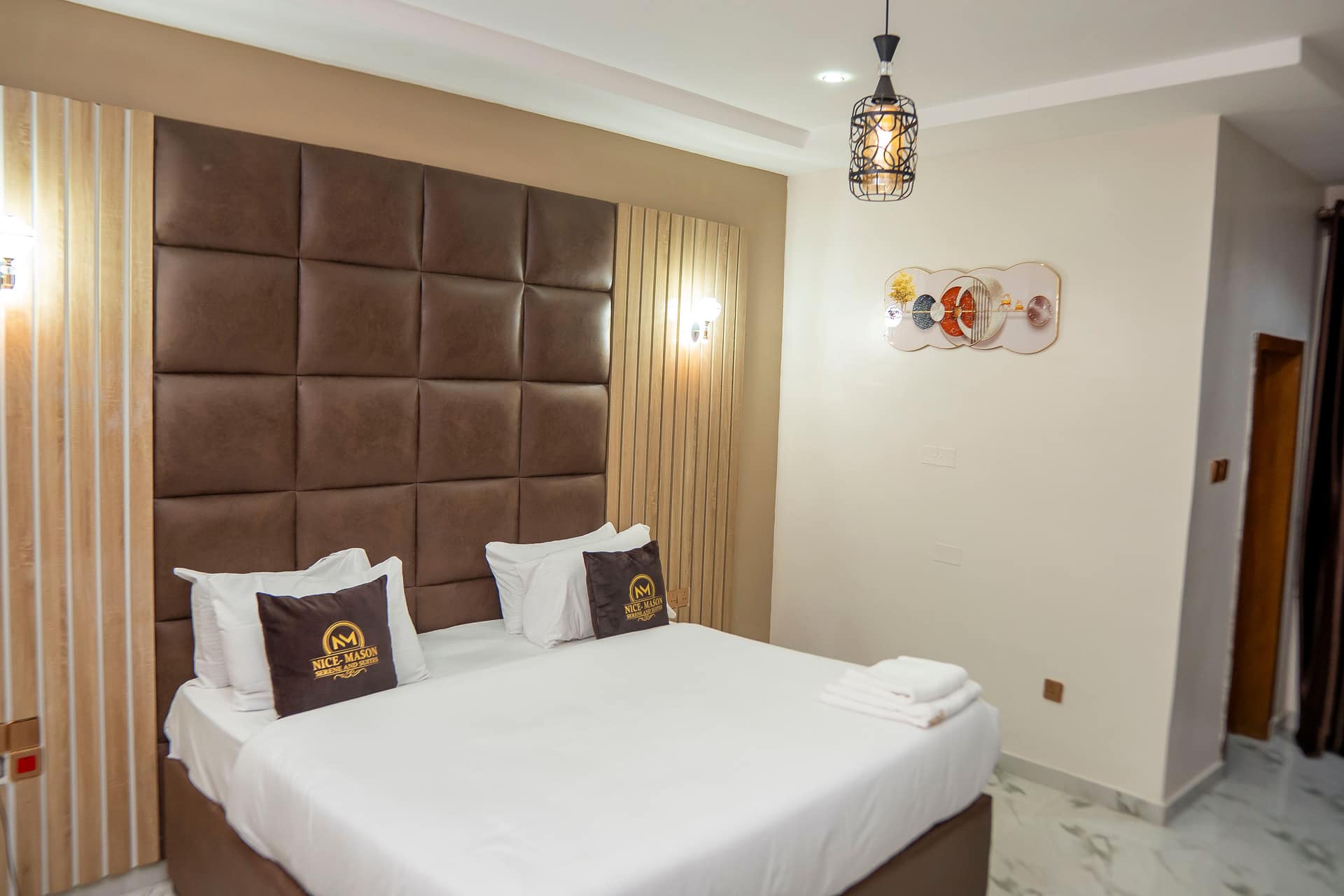 Special Mason Luxury room with signature Nice-Mason pillows and leather-panelled headboard